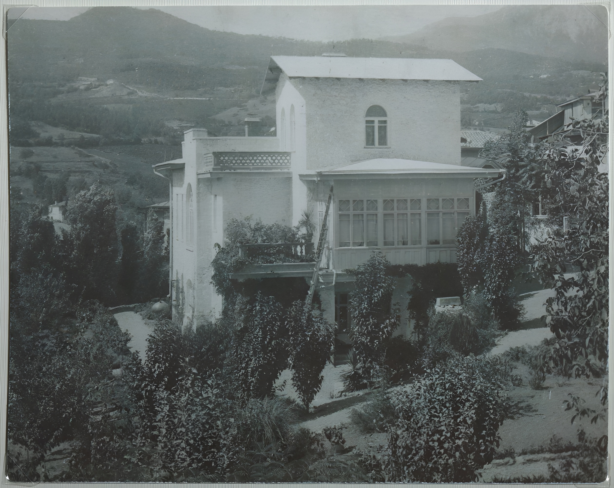 Chekhov's White Dacha, his home in Yalta, a white villa set among trees below the Crimean hills